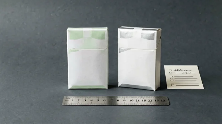Two generic slim-format carton records beside a ruler and comparison checklist